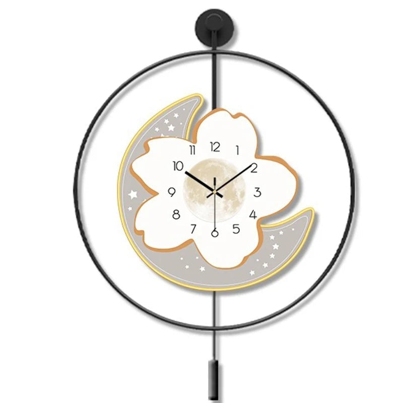 Reloj de pared artístico con péndulo, luna y flores.